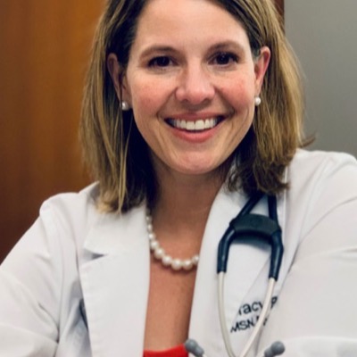 A Meaningful Medicine clinician wearing a white coat and stethoscope